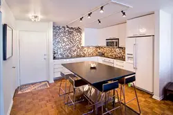 Track lamps in the kitchen in the interior photo