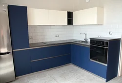 White kitchen with blue bottom photo
