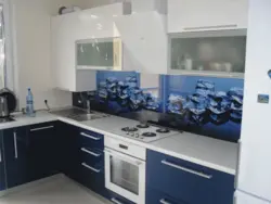 White kitchen with blue bottom photo