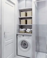 Cabinet above the washing machine in the bathroom design