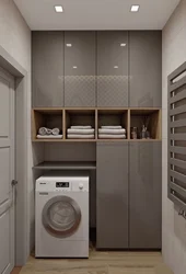 Vanna otağı dizaynında paltaryuyan maşının üstündəki kabinet