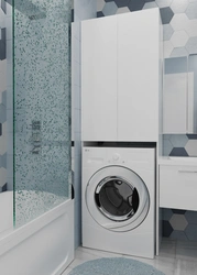 Cabinet above the washing machine in the bathroom design