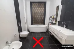 Grout for gray tiles in the bathroom photo