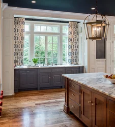 Photo of the kitchen in your house with a window photo
