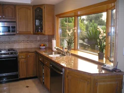 Photo of the kitchen in your house with a window photo
