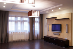 Design of a living room in an apartment with access to a balcony