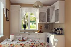 Photo of a kitchen on one wall with a window