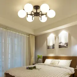 Photo chandeliers low in the bedroom