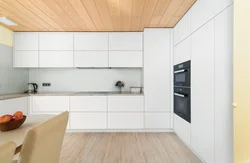 Kitchen with high upper cabinets photo