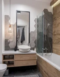 Bathroom design in gray tone with wood