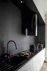 Black apron in the kitchen interior