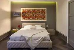 Wall design at the head of the bed in the bedroom photo