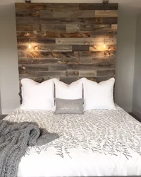 Wall design at the head of the bed in the bedroom photo