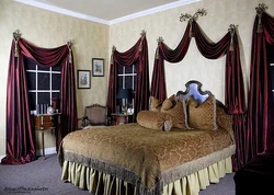 Velvet curtains in the bedroom interior photo