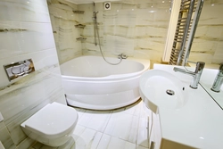 Design Of A Combined Bathroom With A Corner Bath