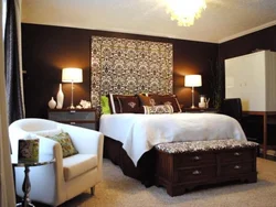 Bedroom with brown wall photo