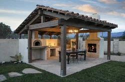 Summer kitchen design with barbecue area