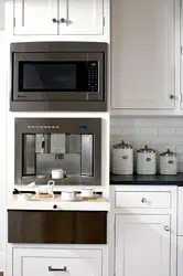 Kitchen interior with built-in microwave
