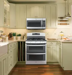 Kitchen interior with built-in microwave