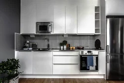 Kitchen interior with built-in microwave