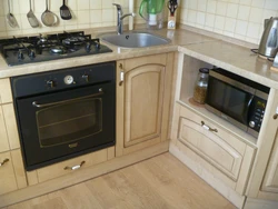Kitchen interior with built-in microwave