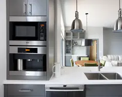 Kitchen interior with built-in microwave