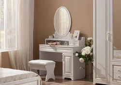 Photo of a dressing table in the bedroom with a mirror