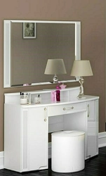 Photo of a dressing table in the bedroom with a mirror