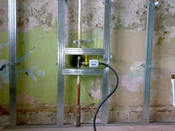 Photo of how to close a pipe on a kitchen wall