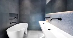 Gray porcelain tiles in the bathroom interior