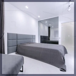 Gray suspended ceiling in the bedroom photo