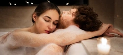 Photo of a couple in a bubble bath
