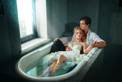 Photo of a couple in a bubble bath