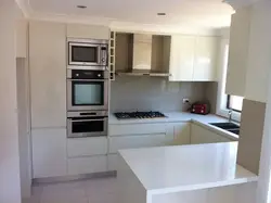 Photo of kitchen in line with refrigerator