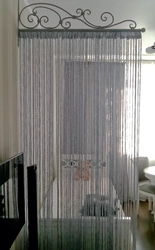 Thread curtains in the living room photo