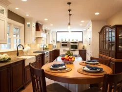 Kitchen design with a large table photo