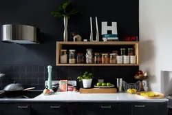 Black wall in the kitchen interior photo