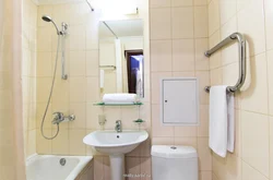 Toilet and bath in an ordinary apartment photo
