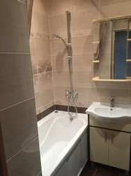 Toilet and bath in an ordinary apartment photo