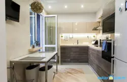 Bright kitchen design with balcony