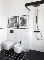Photo of black and white bathtubs with showers