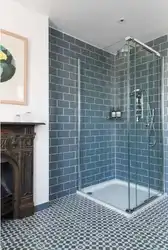 Bathroom with tile shower without tray design