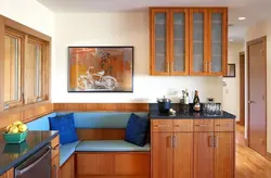 Small kitchen design with corner sofa