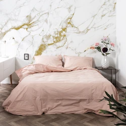 Bedroom design with marbled wallpaper