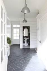 Gray tiles in the hallway interior