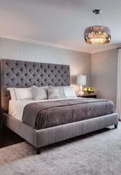 Dark gray bed in the bedroom photo