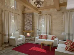 Living room in a modern style in a wooden house photo