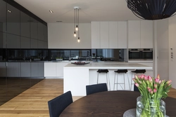 Kitchen with black table photo