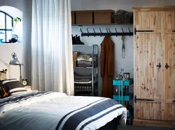 Dressing room with curtains instead of doors in the bedroom photo