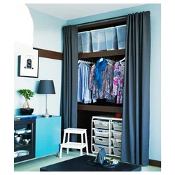 Dressing room with curtains instead of doors in the bedroom photo